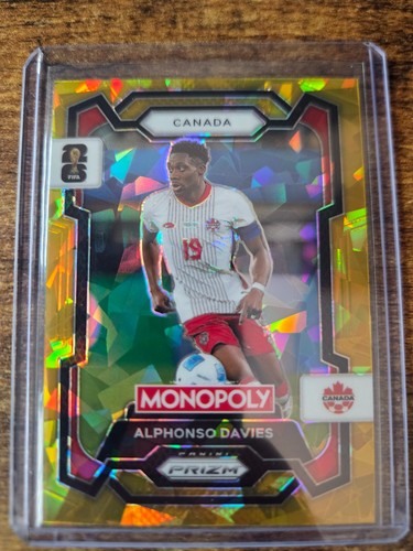 Alphonso Davies 2026 Panini Prizm Copa Mundial de la FIFA 2026 Gold Cracked Ice #78