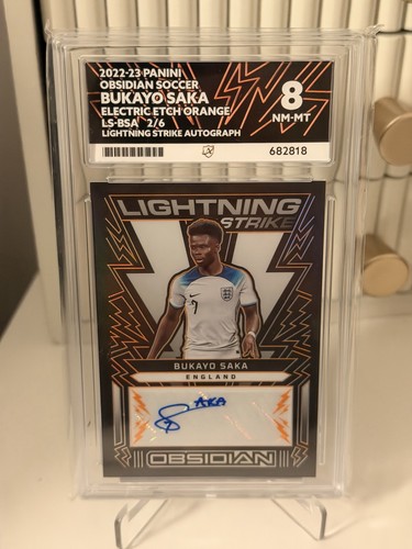 Bukayo Saka 2023 Panini Obsidian Orange 2/6