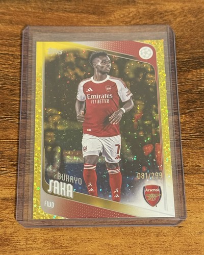 Bukayo Saka 2025 Topps UCC Amarillo Inferno Holo /299