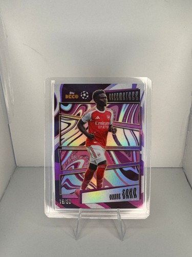 Bukayo Saka 2025 Topps UCC Deco Razzmatazz Purple /50
