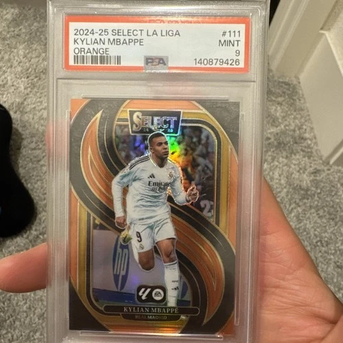 Kylian Mbappé 2024 Panini Select Naranja /49