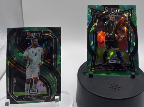 Marc-Andre ter Stegen and Jonathan Tah 2024 Panini Select FIFA Cracked Ice Green