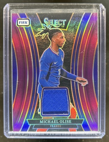 Michael Olise 2024 Panini Select FIFA Viola /49