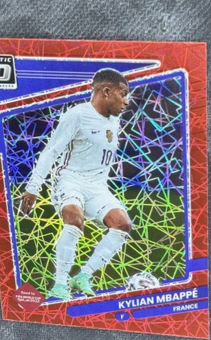 Kylian Mbappe 2021 Panini Donruss Road to Qatar Optic Red Velocity Prizm